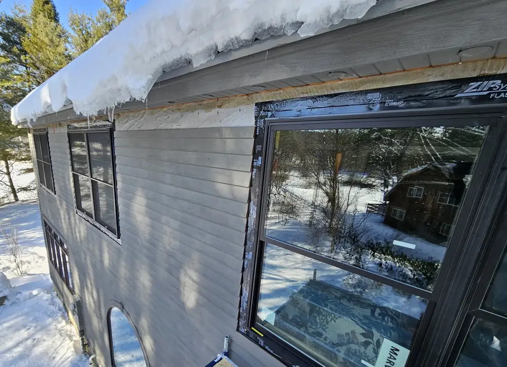 New Marvin window set and sealed with ZIP flashing tape